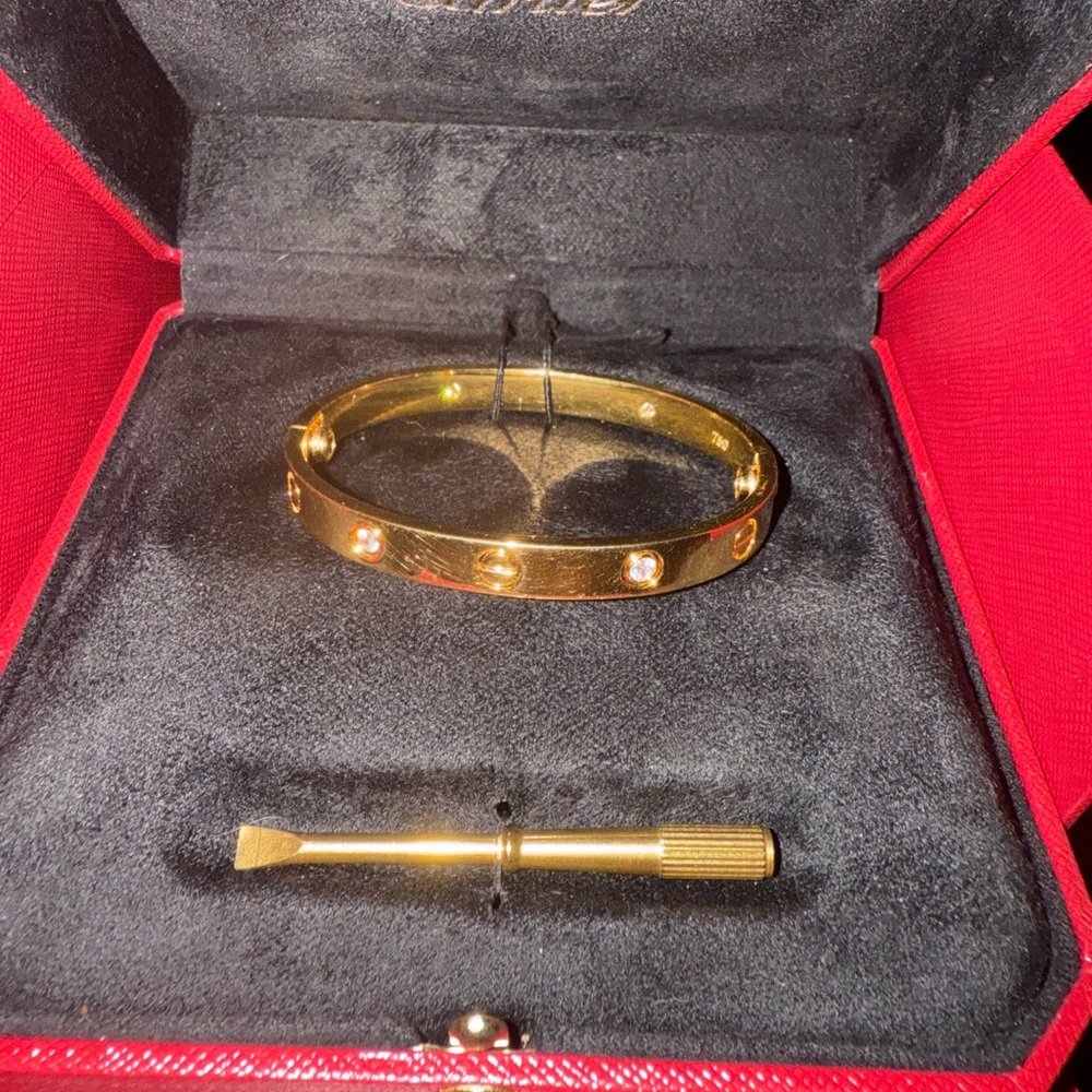CARTIER 18k yellow gold with beautiful diamonds size 16 just just had polished